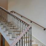 iron spindles and timber handrail