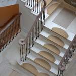 iron balustrade and timber handrail and twin scroll