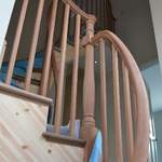 staircase with bespoke timber handrail and newel post