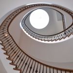 Cut string curved stair and skylight