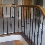 Oak nosing, curved Oak handrail and wrought iron balusters